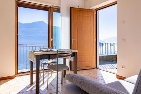 Patio, Day, Natural landscape, View (from property/room), Balcony/Terrace, Living room, Seating area, Dining area, Lake view, Mountain view