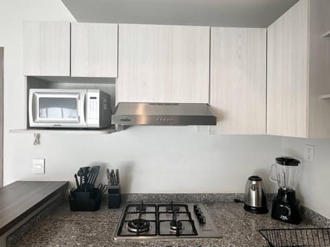 Kitchen or kitchenette, microwave, oven, kitchen