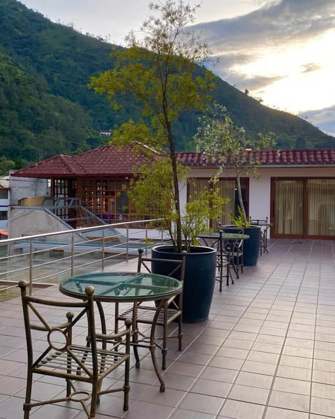 Property building, Patio, Day, Natural landscape, Dining area, Mountain view, Swimming pool