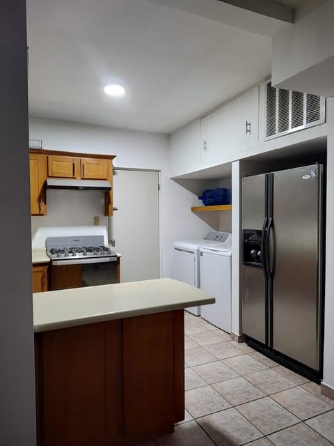 Kitchen or kitchenette, washing machine