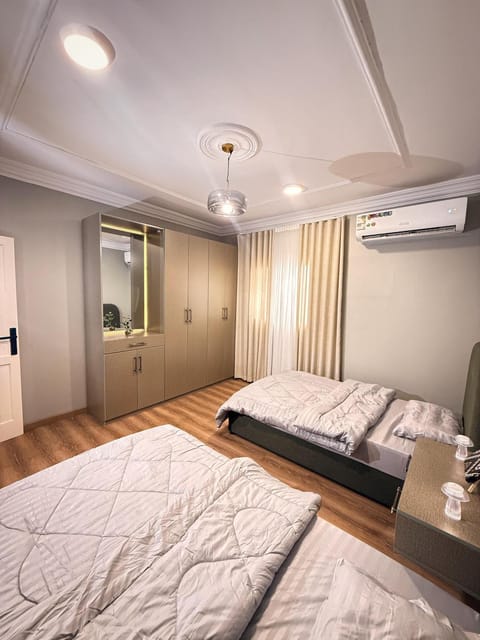 Bed, Photo of the whole room, Bedroom, towels, air conditioner