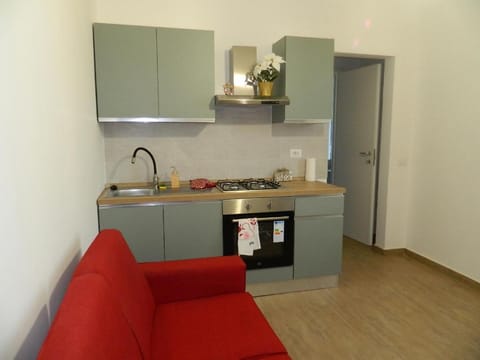 Kitchen or kitchenette, Living room, Seating area, oven, stove