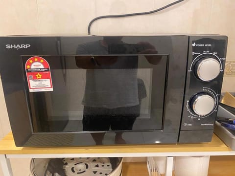 Kitchen or kitchenette, microwave