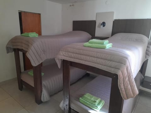 Photo of the whole room, bunk bed, towels