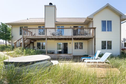 Experience lakeside luxury at Sunset Cove, a spacious 5-bedroom home House in Grand Haven