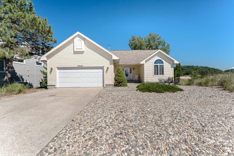 Experience lakeside luxury at Sunset Cove, a spacious 5-bedroom home House in Grand Haven