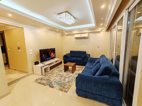 TV and multimedia, Living room, Seating area, air conditioner