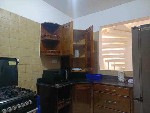 Kitchen or kitchenette, oven, stove