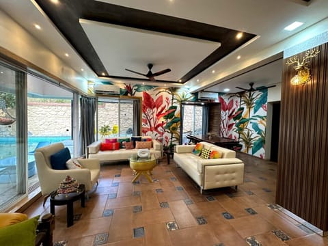 Living room, Seating area, Pool view