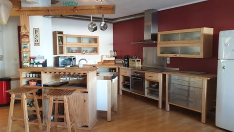 Kitchen or kitchenette, dishwasher, oven, stove, toaster