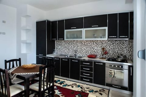 Kitchen or kitchenette, Dining area, dishwasher, oven, stove, toaster