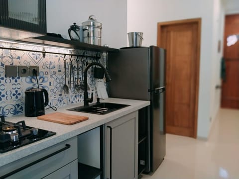 Kitchen or kitchenette, dishwasher, stove, kitchen