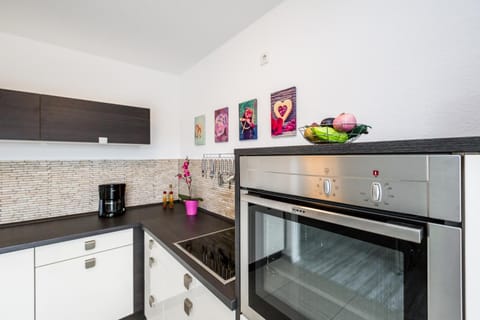 Kitchen or kitchenette, oven, stove