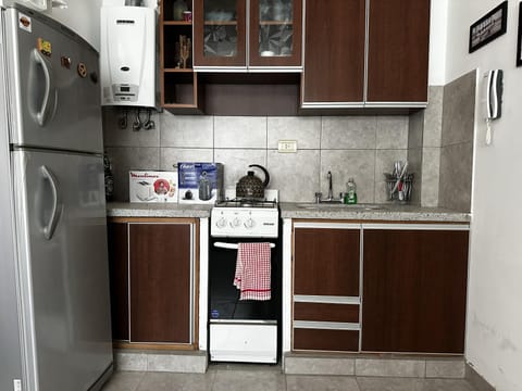 Kitchen or kitchenette, oven, stove