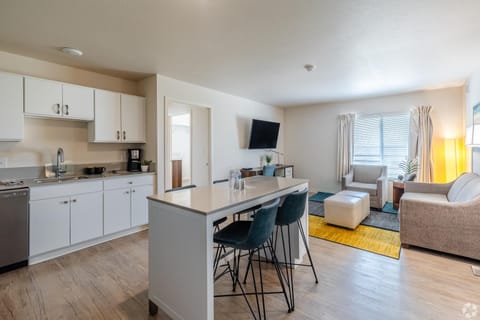 TV and multimedia, Kitchen or kitchenette, Living room, Seating area, Dining area, oven, stove, kitchen