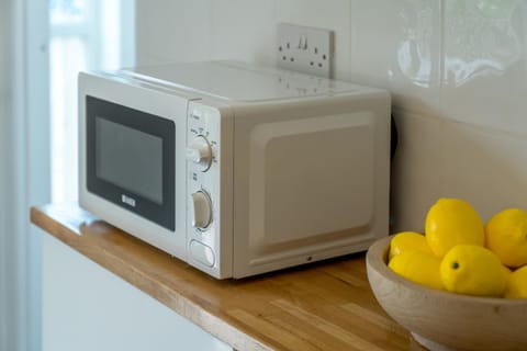 Kitchen or kitchenette, microwave