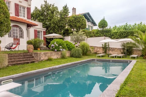 Property building, Patio, Garden, Swimming pool