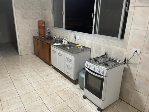 Kitchen or kitchenette, dishwasher, oven, stove