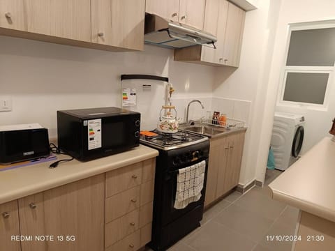 Kitchen or kitchenette, oven, stove, toaster