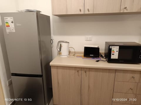 Kitchen or kitchenette, oven