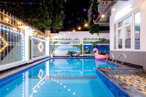 Patio, Night, Pool view, Swimming pool, sunbed