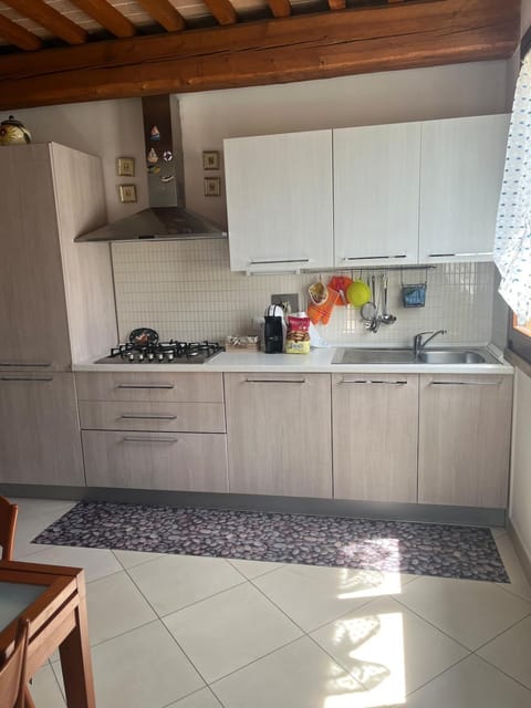 Kitchen or kitchenette, dishwasher, stove