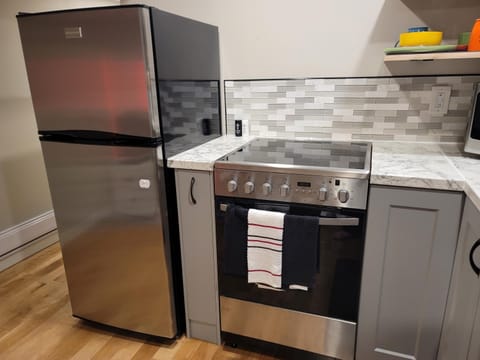 Kitchen or kitchenette, oven, stove