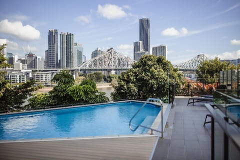 Property building, Nearby landmark, Day, City view, Swimming pool