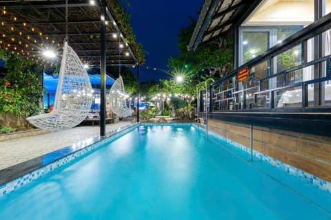 Property building, Night, Pool view, Swimming pool