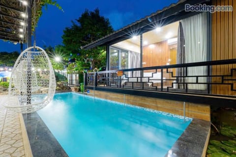 Property building, Night, Pool view, Swimming pool