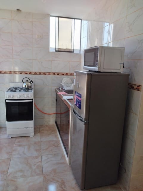 Kitchen or kitchenette, oven, stove