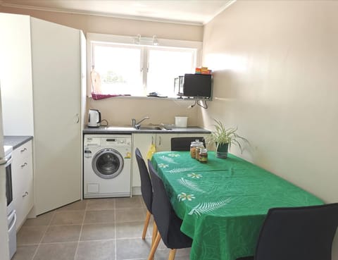 Dining area, microwave, washing machine, kitchen