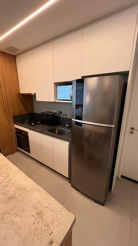 Kitchen or kitchenette, dishwasher, minibar, oven, stove