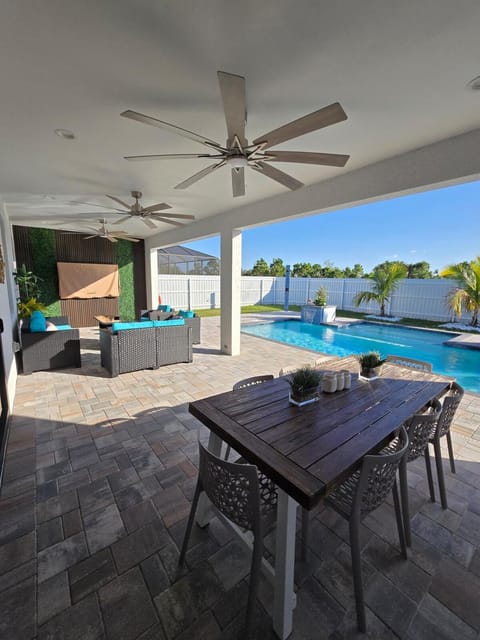 Patio, Dining area, Pool view, Swimming pool