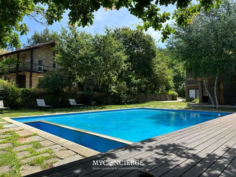 Property building, Spring, Natural landscape, Garden, Pool view, Swimming pool, sunbed