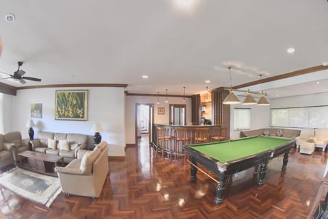 Billiard, Game Room, Living room, Seating area, Evening entertainment, air conditioner