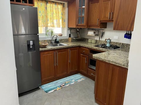 Kitchen or kitchenette, oven, stove, toaster