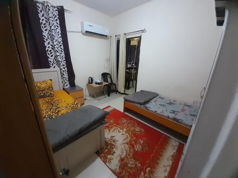 Bed, Living room, Seating area, Bedroom