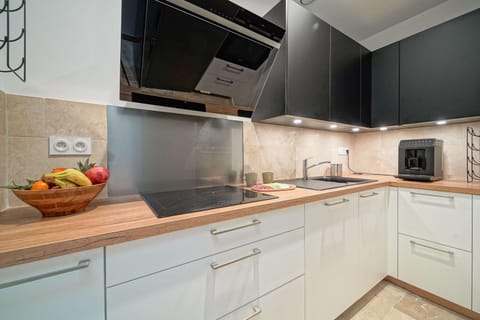 Kitchen or kitchenette, oven, stove, toaster