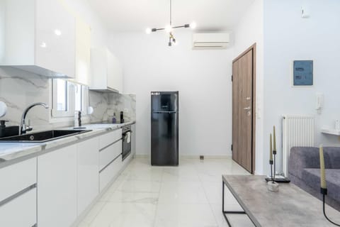 Kitchen or kitchenette, oven, stove, air conditioner