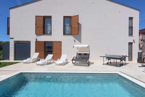 Property building, Patio, Day, Table tennis, Pool view, Swimming pool, sunbed