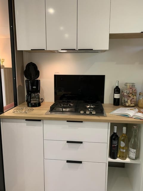 Kitchen or kitchenette, stove