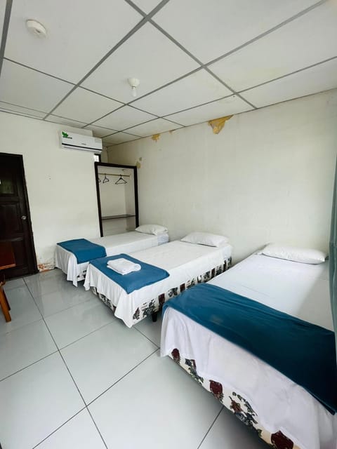 Property building, Bed, room service, towels, air conditioner