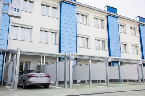 Facade/entrance, Inner courtyard view, Parking