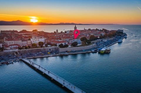 Property building, Nearby landmark, Day, Bird's eye view, City view, Sea view, Sunset
