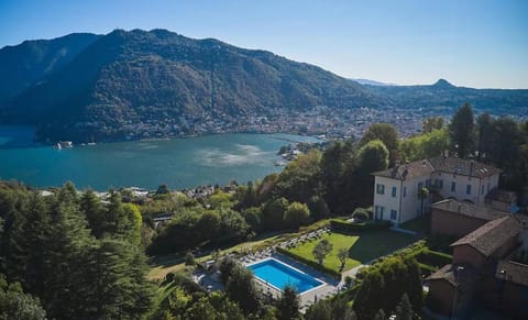 Property building, Day, Natural landscape, City view, Lake view, Mountain view, Pool view, Swimming pool