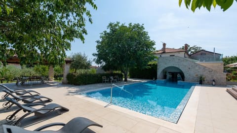 Property building, Garden, Seating area, Swimming pool