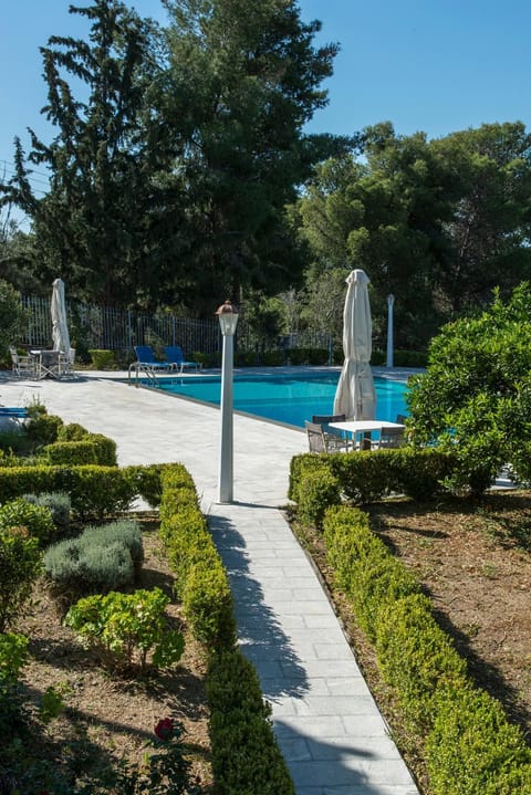 Nearby landmark, Spring, Day, Natural landscape, Garden, Garden view, Pool view, Swimming pool, sunbed