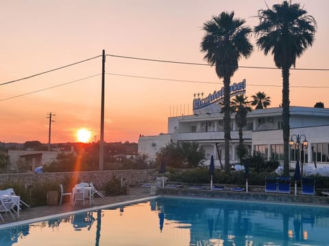 Property building, Swimming pool, Sunset, sunbed