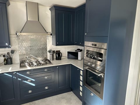 Kitchen or kitchenette, stove, toaster